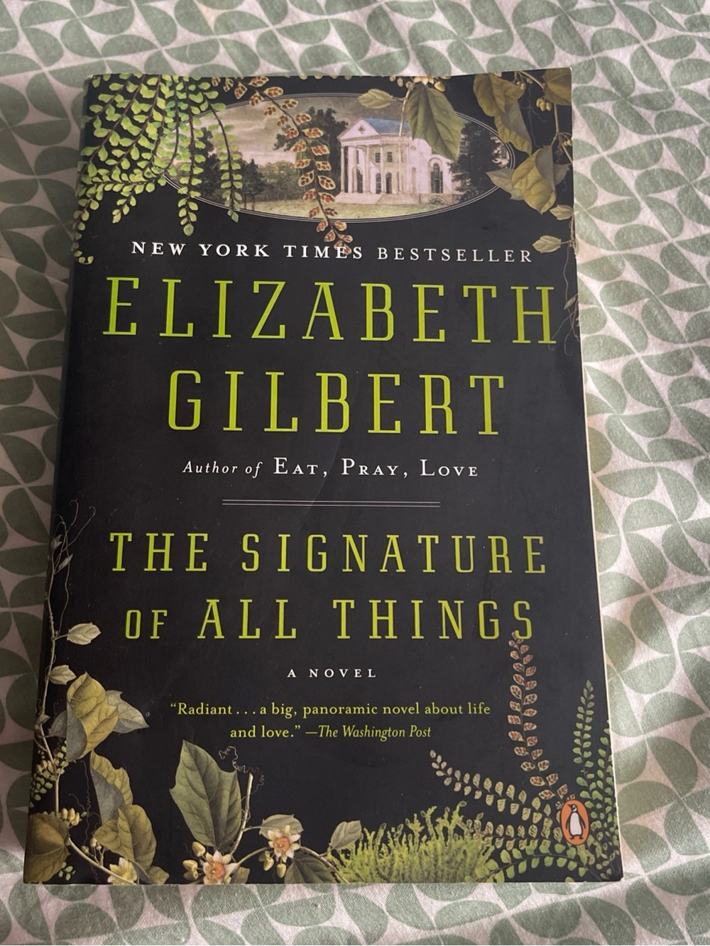 Paperback Novel - Black with Green Botanical Cover